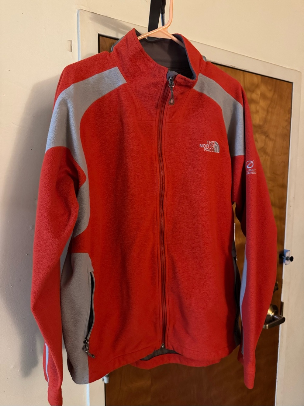 The North Face Orange Fleece Flight Series Jacket with Gray Trim